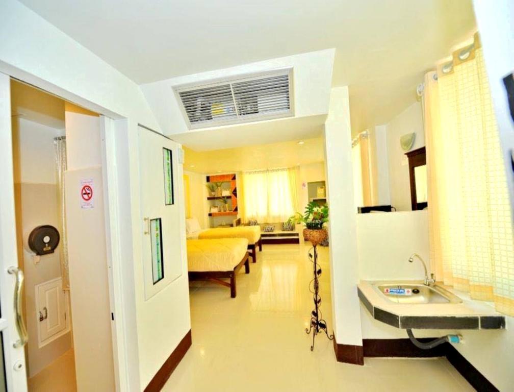 Win Hotel Пхаяу Номер фото